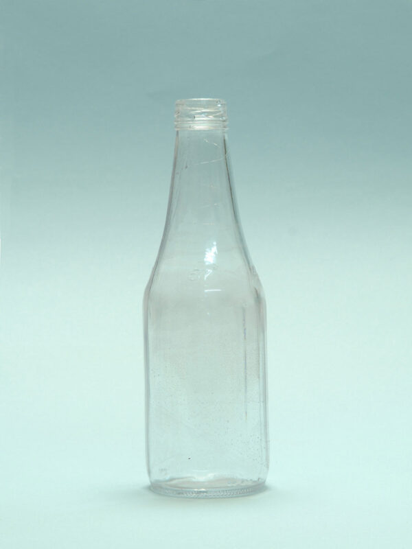 Ketchup bottle made of transparent sugar glass. Dimensions 25 x ø 8 cm.