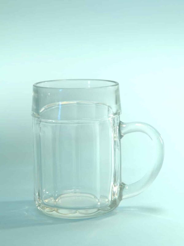 Beer mug 0.5 liter content. Cartel motif. H * W is: 13.5 x 9.3 cm